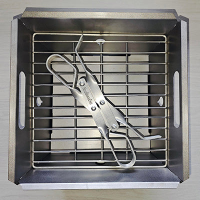 Flat Pack Basic Braai – in use outdoors with coals
