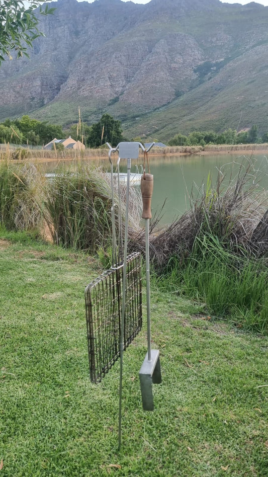 Forken Lekker Braai Hang EM Ground Stake – in use at a campsite braai