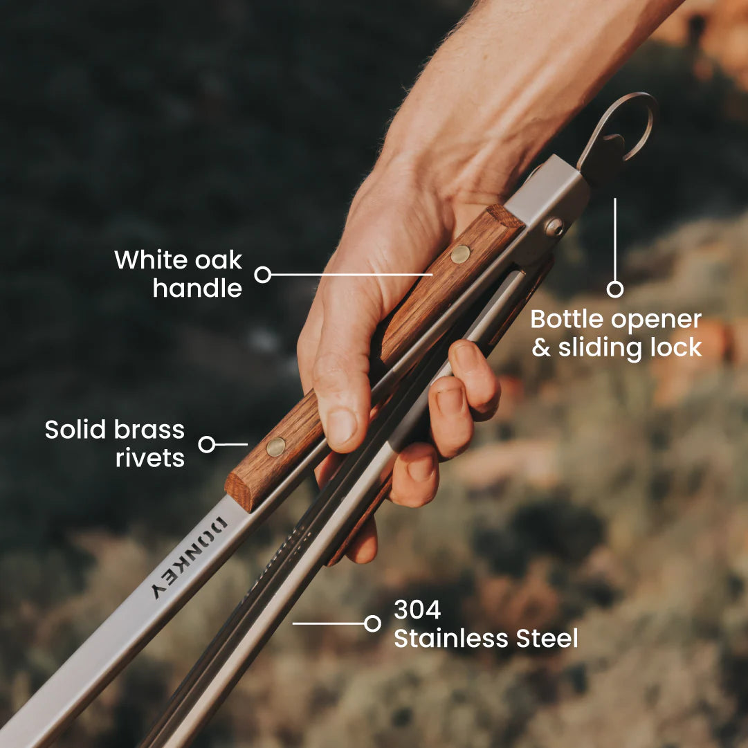 Donkey Long Tong 80cm – in use turning meat on the grid
